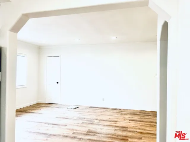 a view of a room with an empty space