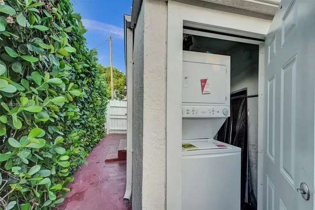 a view of a backyard with sitting area