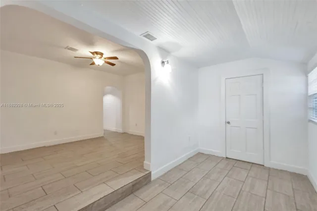 a view of backyard with green space