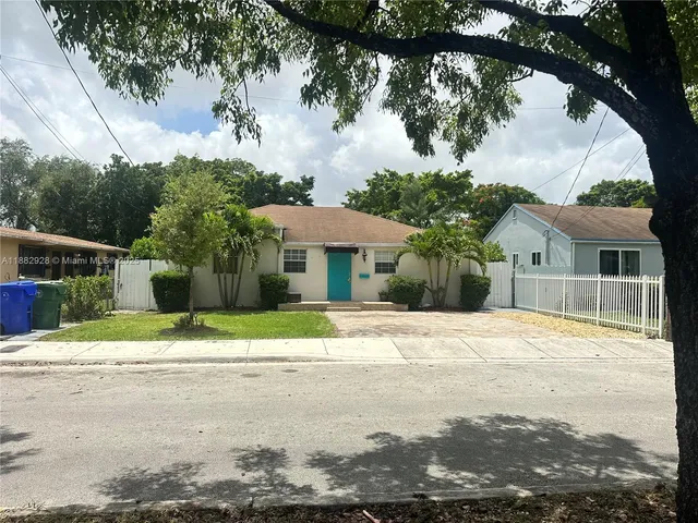 a view of a lake in front of the house