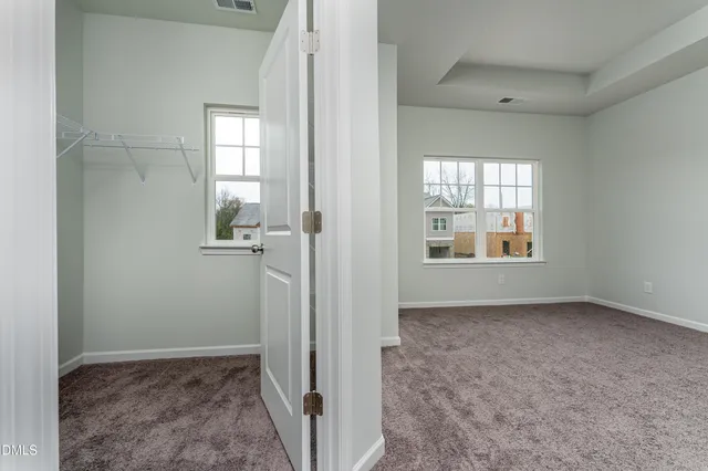 an empty room that has a window