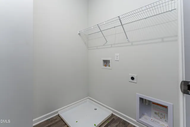 a view of a room with racks on wall