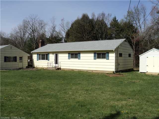 90 Cherry Brook Road Canton, CT 06019 - Photo 1 of 1 a front view of a house with a garden