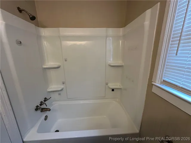 a bathroom with a bathtub