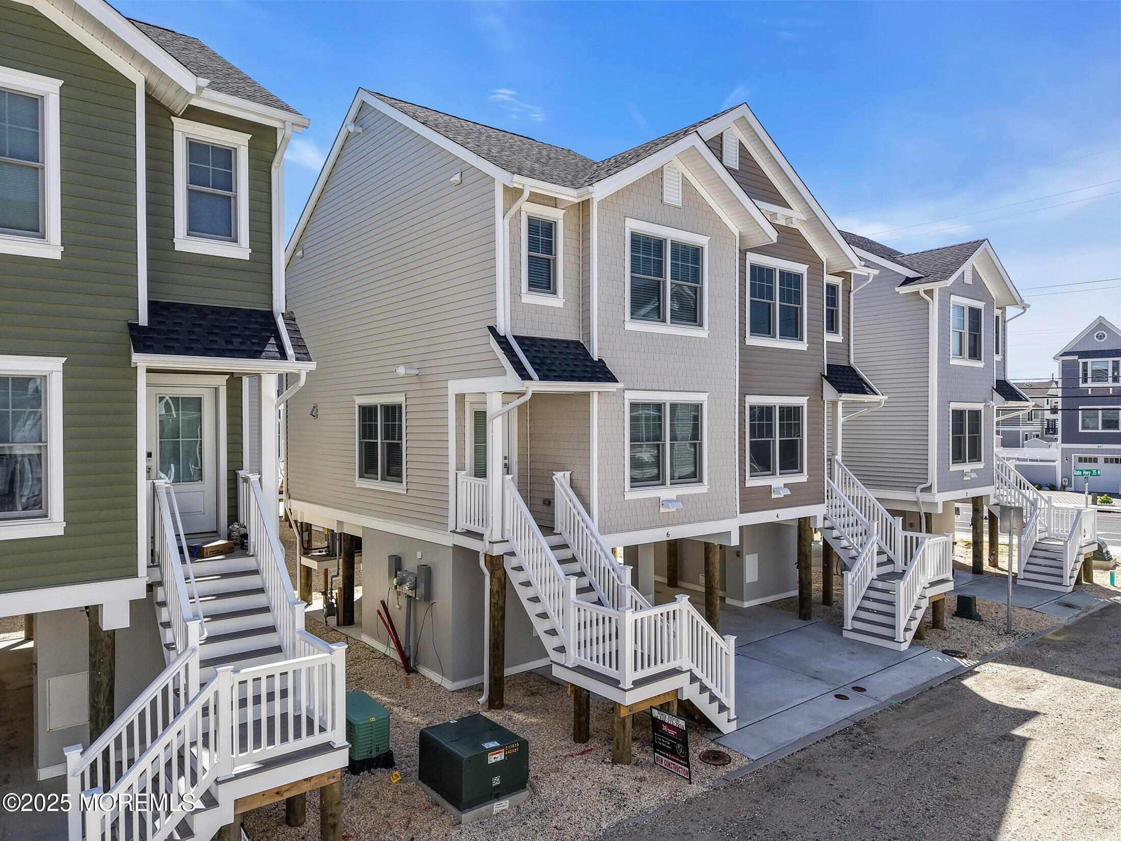 6 Shell Road Mantoloking, NJ 08738 - Photo 31 of 54 a front view of a house with a patio