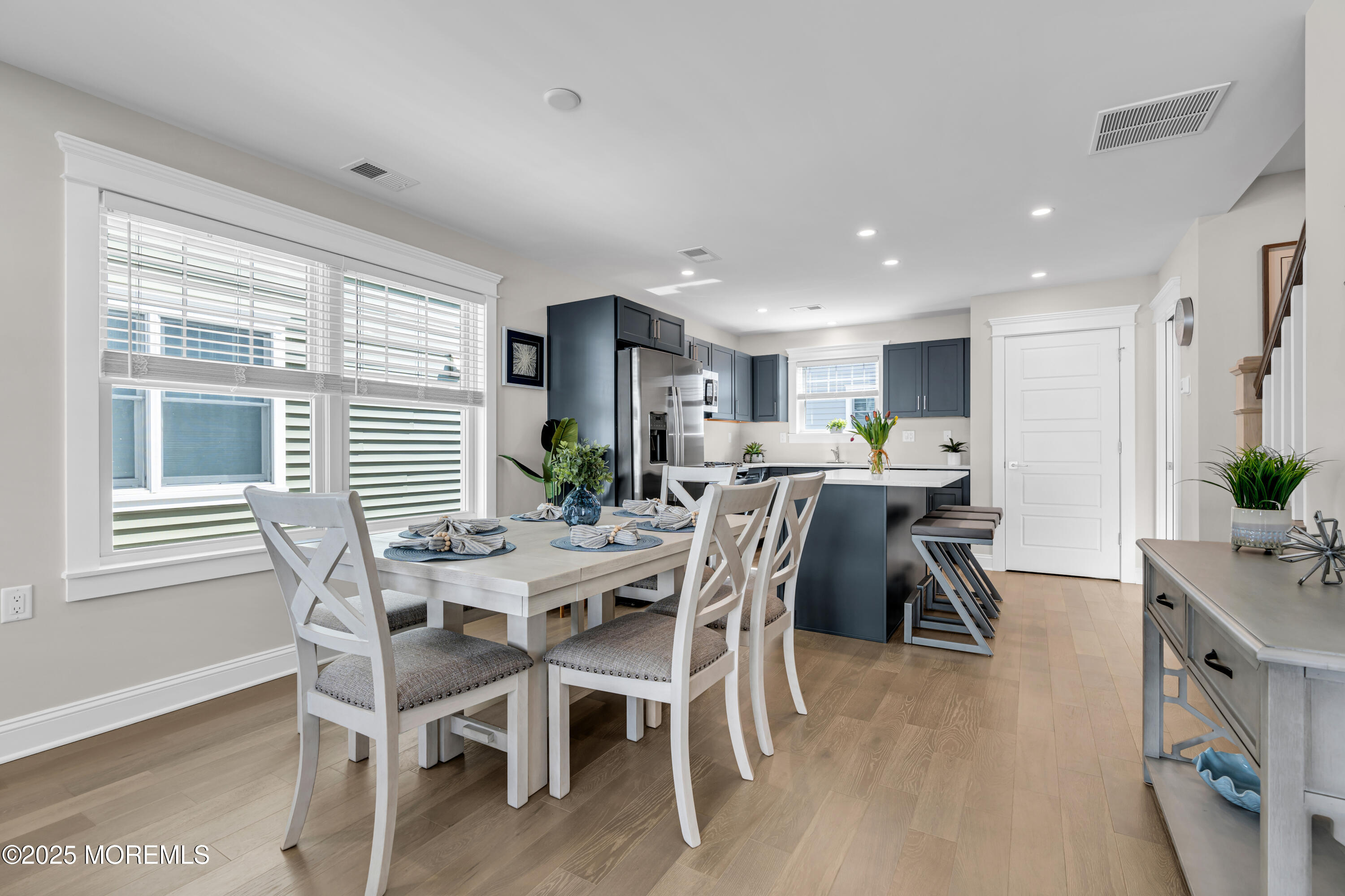 6 Shell Road Mantoloking, NJ 08738 - Photo 6 of 54 a view of a dining room with furniture and a window