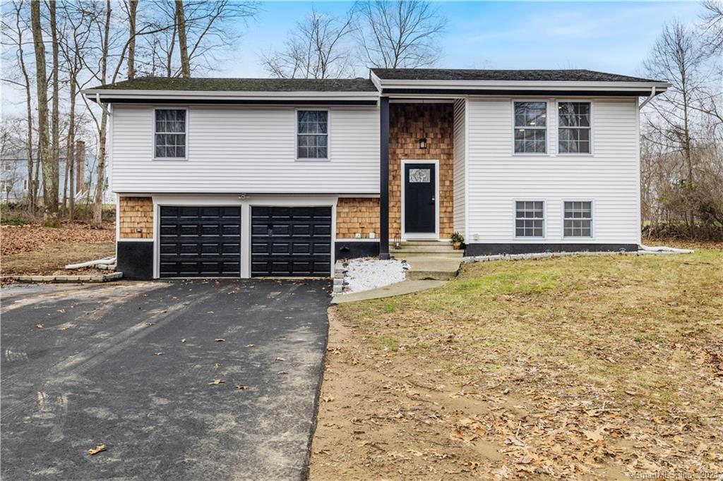 a view of a house with a garage