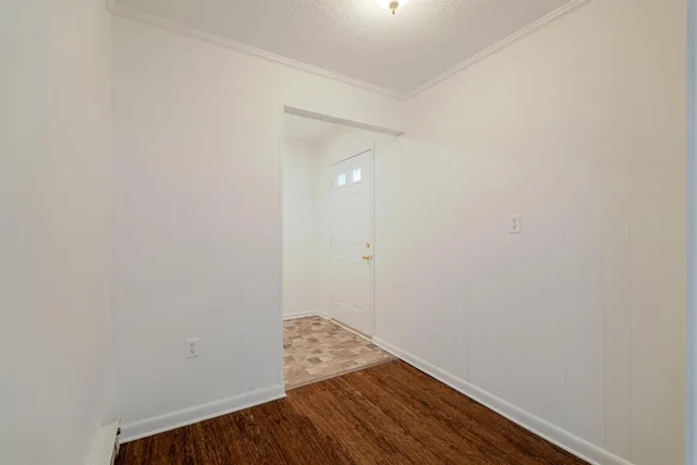 a view of small space with wooden floor