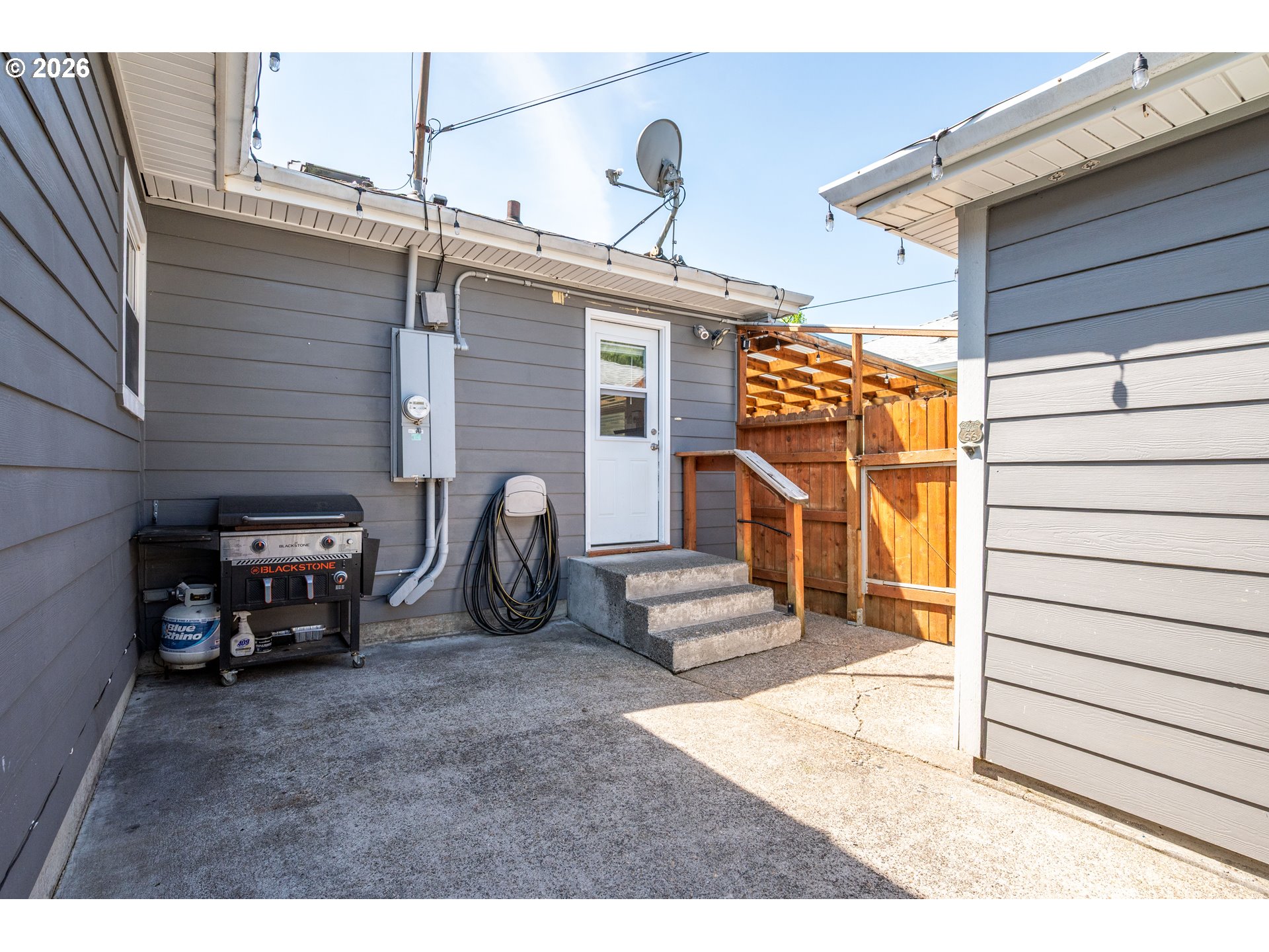 2808 Lilac Street Longview, WA 98632 - Photo 26 of 29 a view of a house with a patio