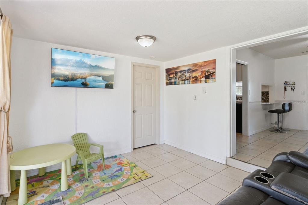 303 Granada Road Auburndale, FL 33823 - Photo 15 of 25 a view of a livingroom with furniture and lounge chair