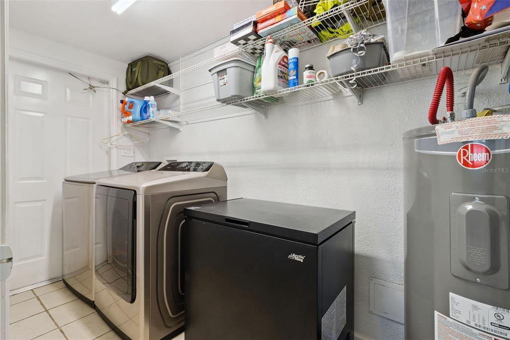303 Granada Road Auburndale, FL 33823 - Photo 16 of 25 a utility room with dryer and washer