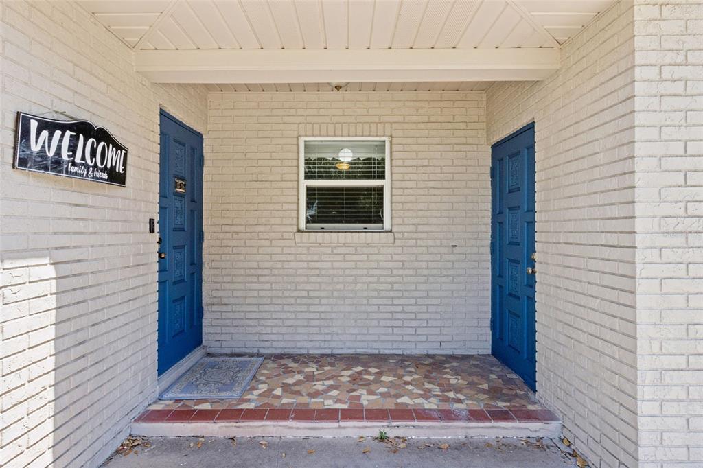 303 Granada Road Auburndale, FL 33823 - Photo 2 of 25 a view of a door and a window