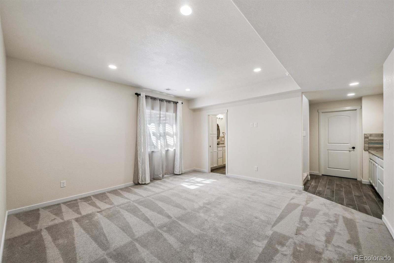 3674 Watts Street Timnath, CO 80547 - Photo 21 of 50 a view of an empty room