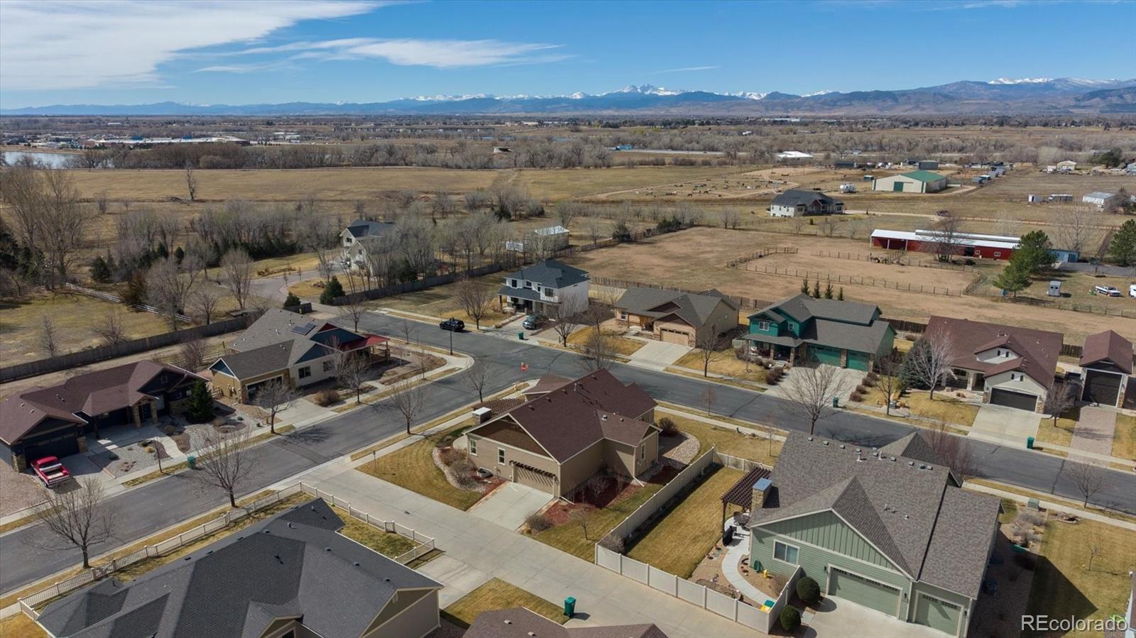 3674 Watts Street Timnath, CO 80547 - Photo 32 of 50 an aerial view of a city with lots of residential buildings