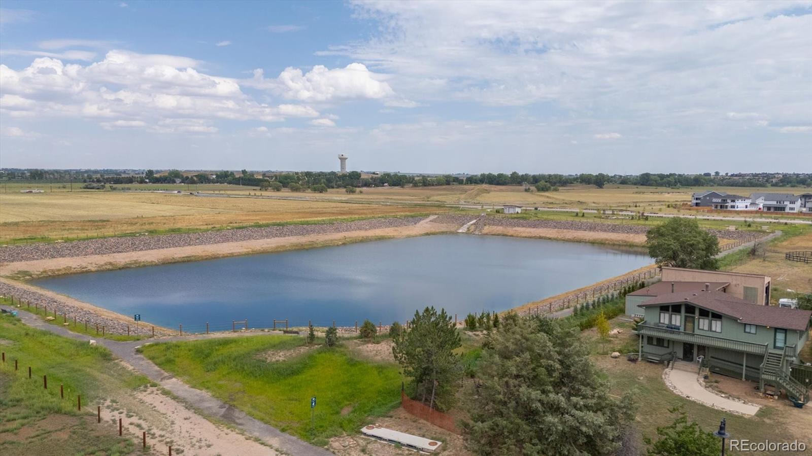 3674 Watts Street Timnath, CO 80547 - Photo 42 of 50 a view of a city and lake view