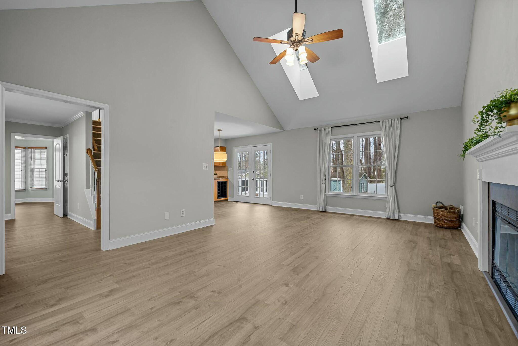 8304 Bellingham Circle Raleigh, NC 27615 - Photo 10 of 47 Family Room with Kitchen Acess
