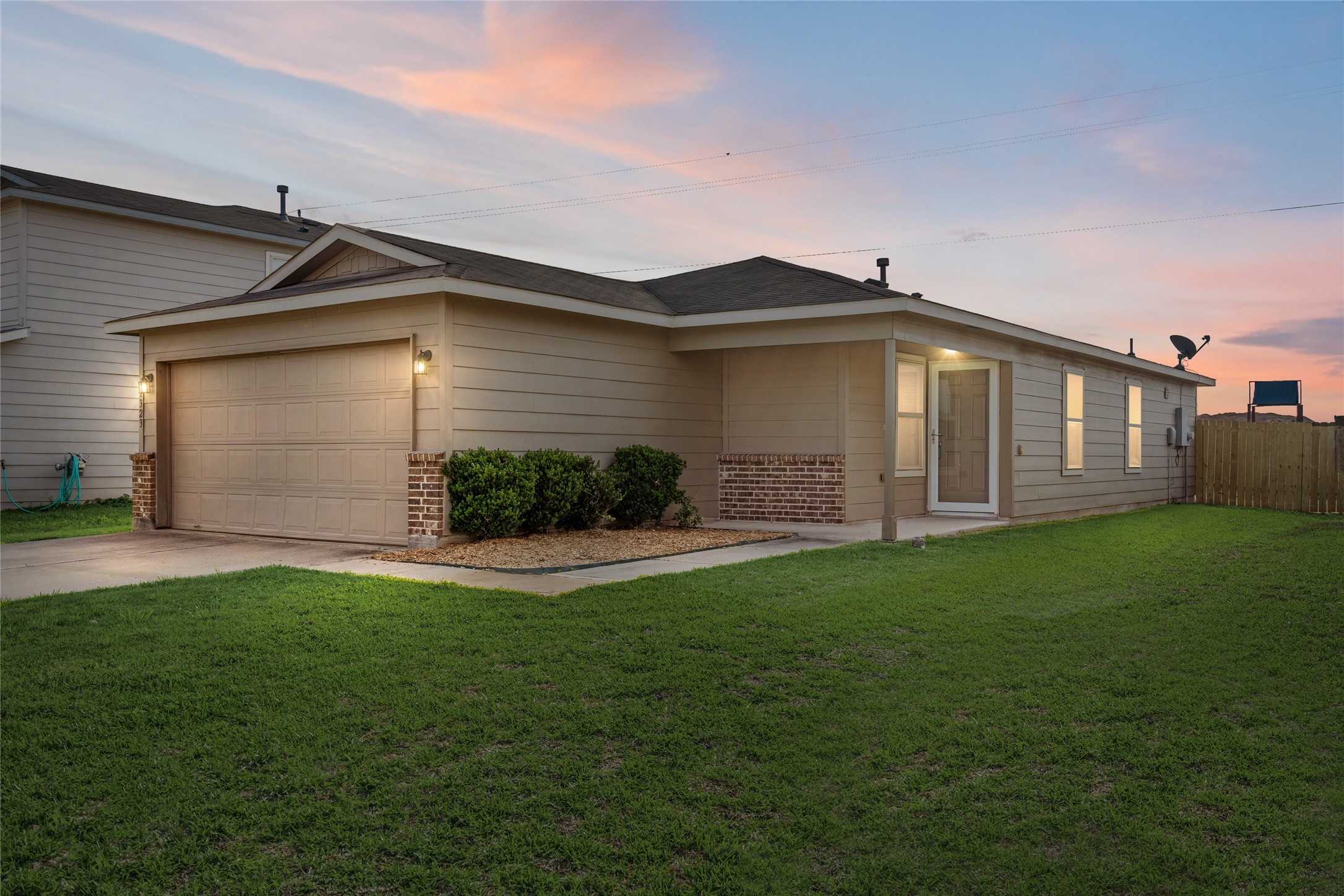 1323 Pease River Lane Rosenberg, TX 77471 - Photo 1 of 31 a front view of house with yard and green space
