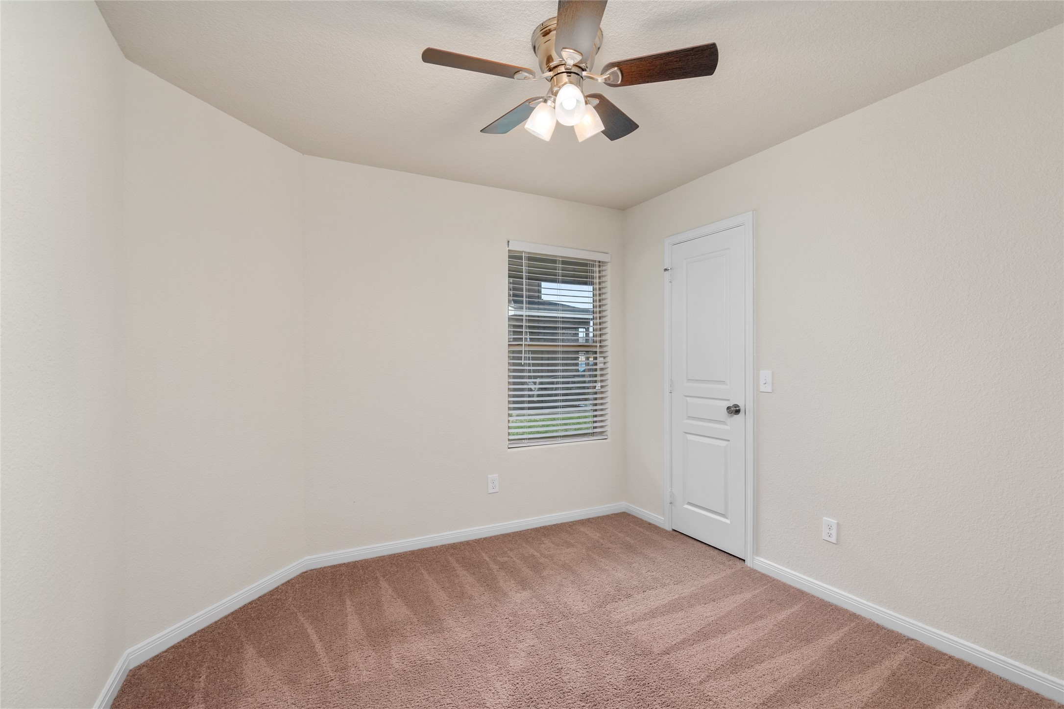 1323 Pease River Lane Rosenberg, TX 77471 - Photo 22 of 31 a view of an empty room with a window