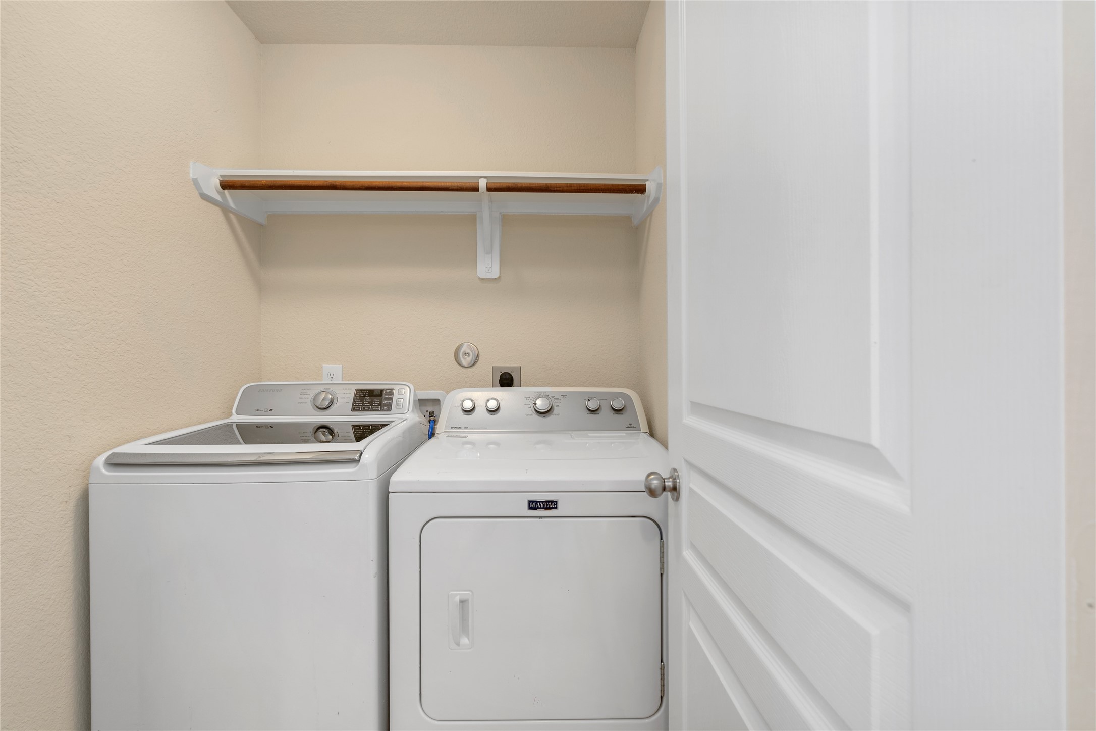 1323 Pease River Lane Rosenberg, TX 77471 - Photo 25 of 31 a utility room with dryer and washer