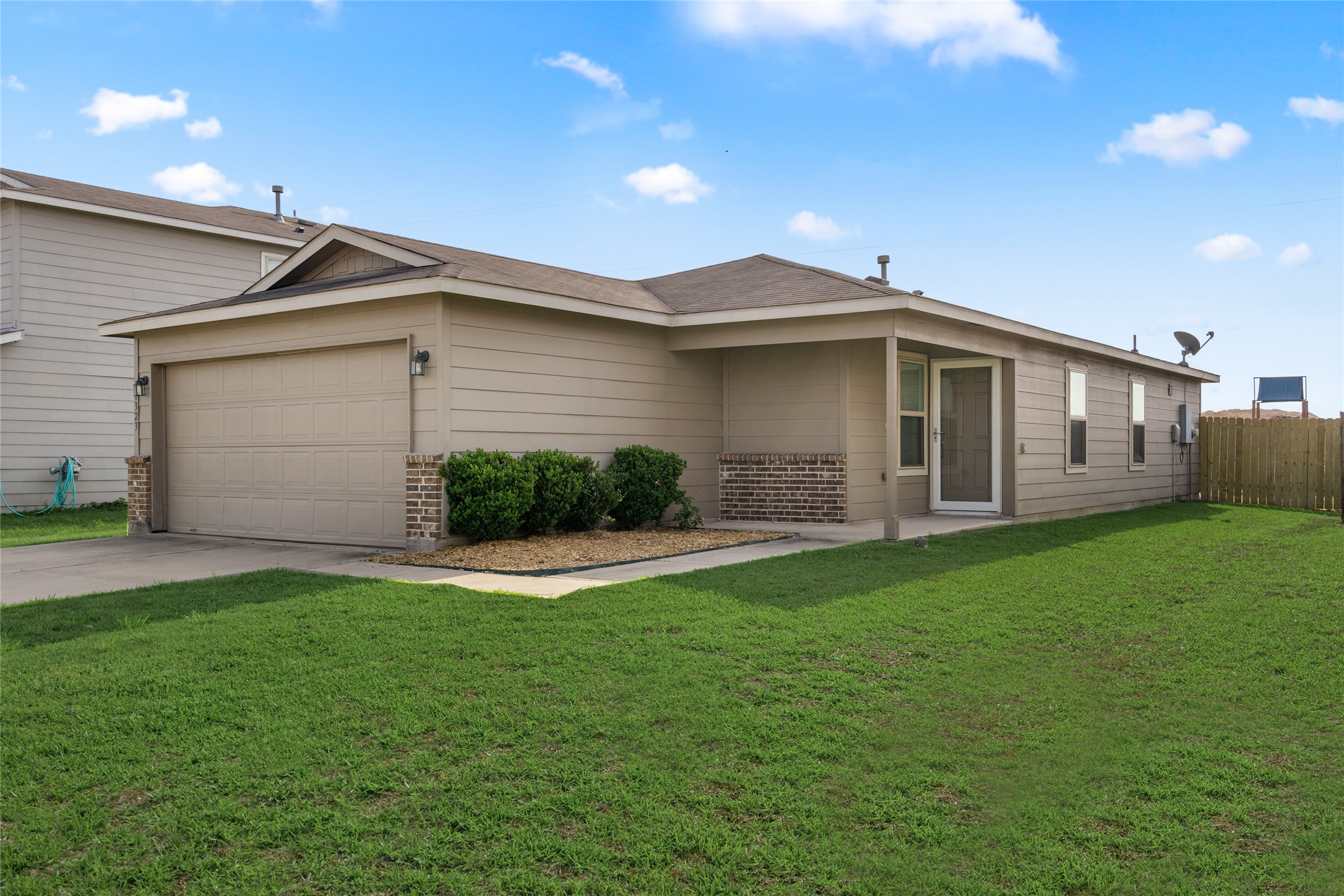 1323 Pease River Lane Rosenberg, TX 77471 - Photo 4 of 31 a front view of house with yard and green space