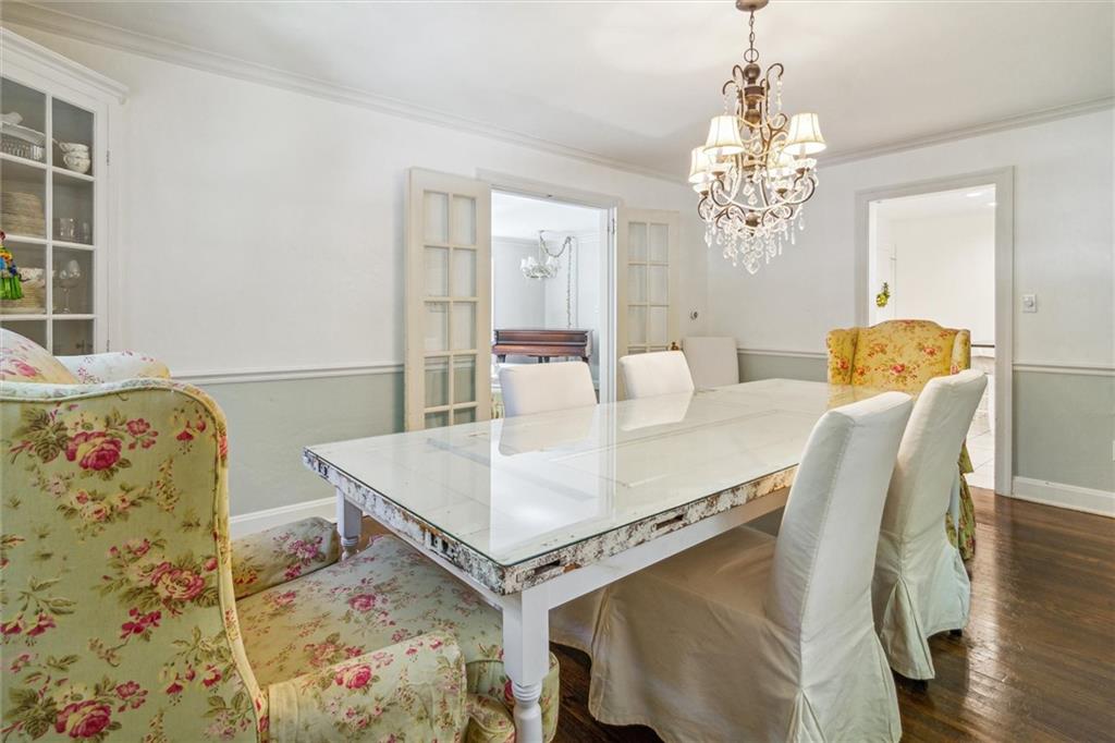 346 Midway Road Pittsburgh, PA 15216 - Photo 14 of 47 a view of a dining room with furniture and wooden floor