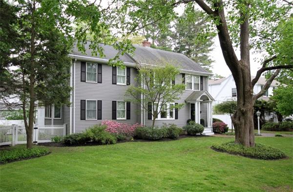 23 Pine Plain Road Wellesley, MA 02481 - Photo 1 of 26 a front view of a house with a garden