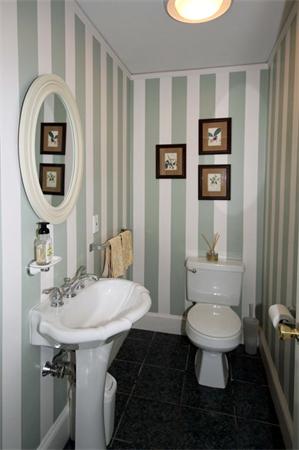 23 Pine Plain Road Wellesley, MA 02481 - Photo 12 of 26 a bathroom with a toilet a sink and a mirror