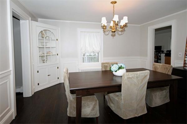 23 Pine Plain Road Wellesley, MA 02481 - Photo 5 of 26 a view of a dining room with furniture and chandelier