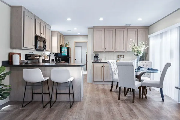 a view of kitchen with breakfast area