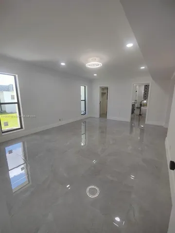 a bathroom with a sink a mirror and a bathtub