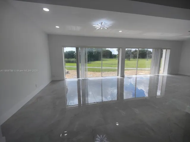 a view of a room with an empty space