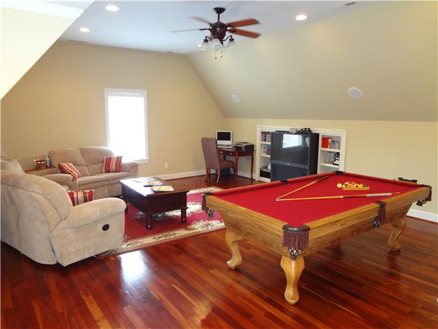 2059 Crescentview Road Pulaski, TN 38478 - Photo 18 of 20 a living room with furniture pool table and a wooden floor