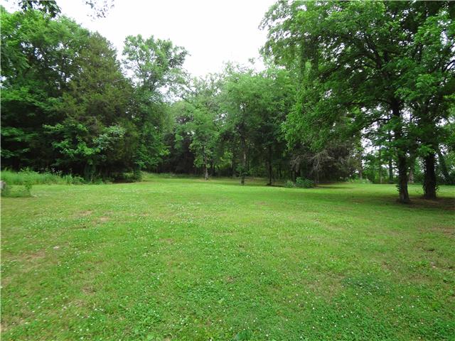 2059 Crescentview Road Pulaski, TN 38478 - Photo 20 of 20 a view of a green field with trees in the background