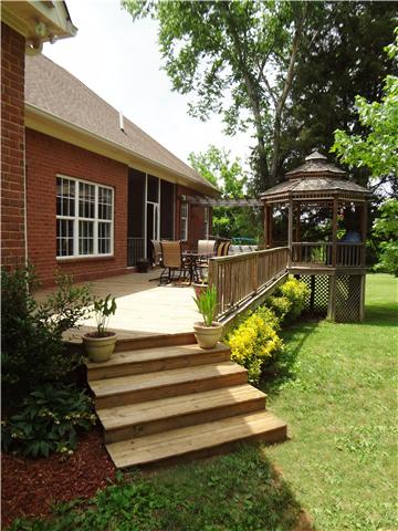 2059 Crescentview Road Pulaski, TN 38478 - Photo 5 of 20 a view of a house with backyard and sitting area