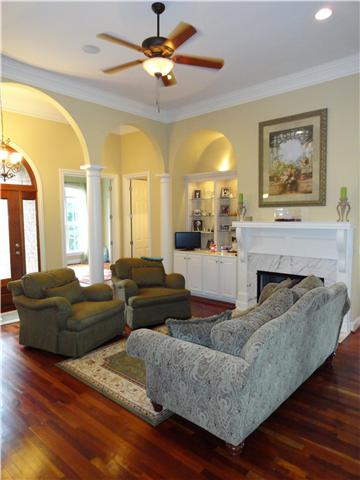 2059 Crescentview Road Pulaski, TN 38478 - Photo 9 of 20 a living room with furniture and a fireplace