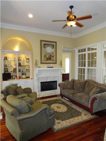 2059 Crescentview Road Pulaski, TN 38478 - Photo 10 of 20 a living room with furniture and a fireplace