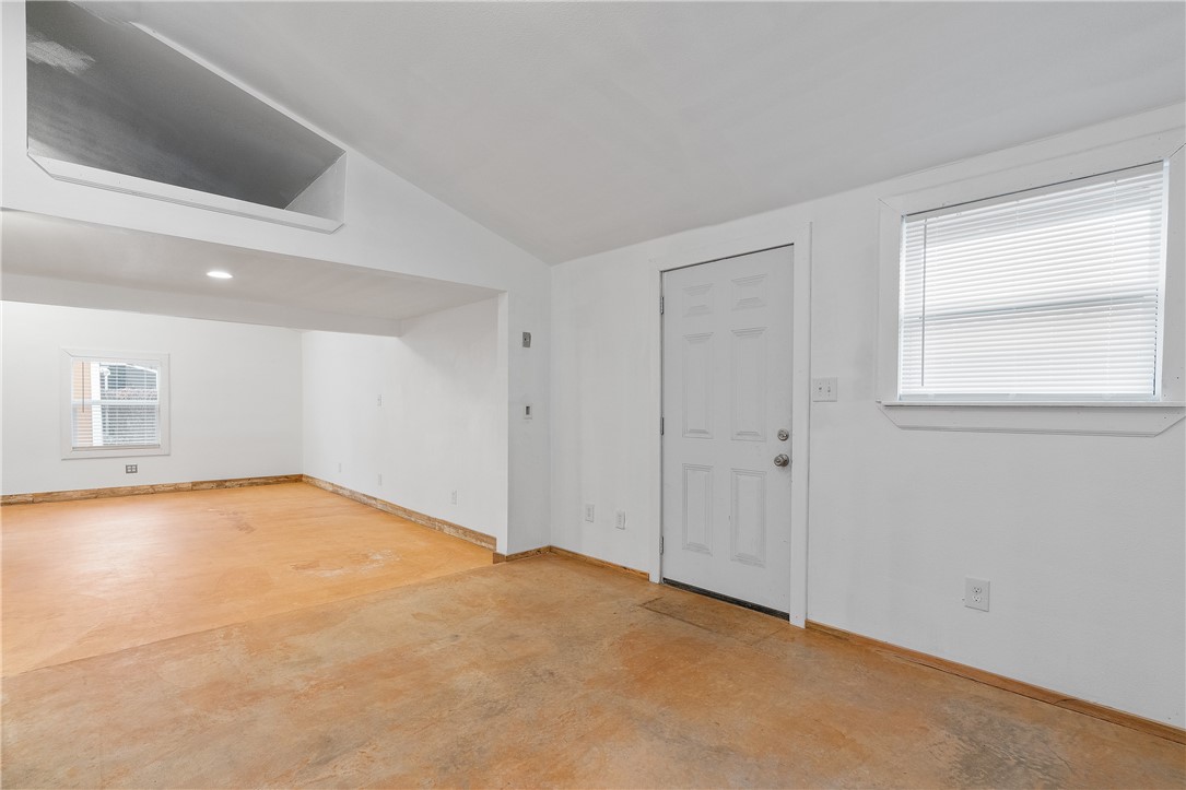 4414 Diane Drive, Unit 1B Austin, TX 78745 - Photo 12 of 15 an empty room with windows