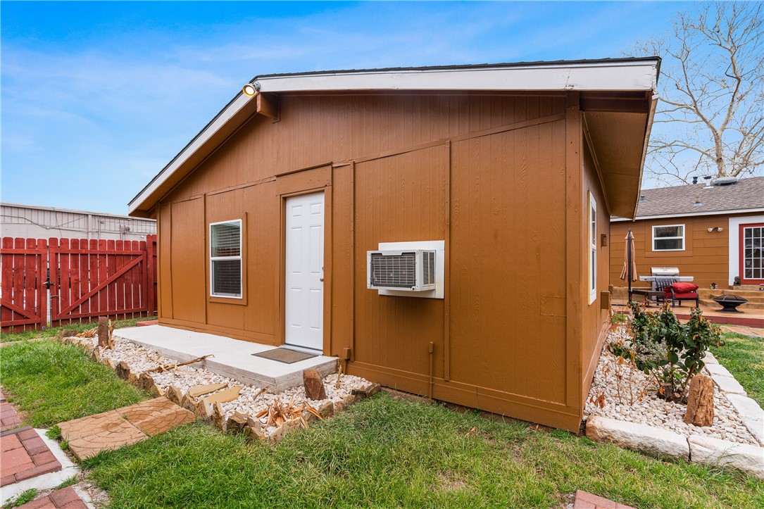 4414 Diane Drive, Unit 1B Austin, TX 78745 - Photo 15 of 15 a front view of a house with a yard