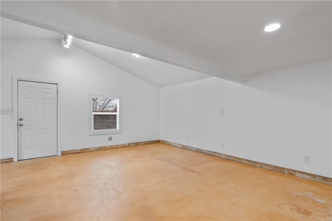 4414 Diane Drive, Unit 1B Austin, TX 78745 - Photo 9 of 15 an empty room with a empty space and a window