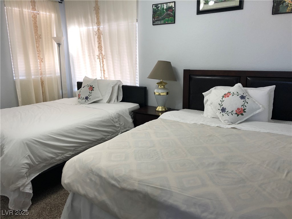 5423 Dancing Bear Drive Las Vegas, NV 89113 - Photo 12 of 18 View of carpeted bedroom
