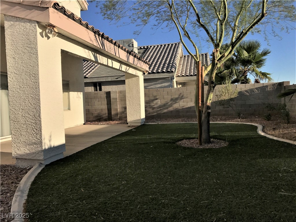 5423 Dancing Bear Drive Las Vegas, NV 89113 - Photo 18 of 18 Fenced backyard featuring a patio area