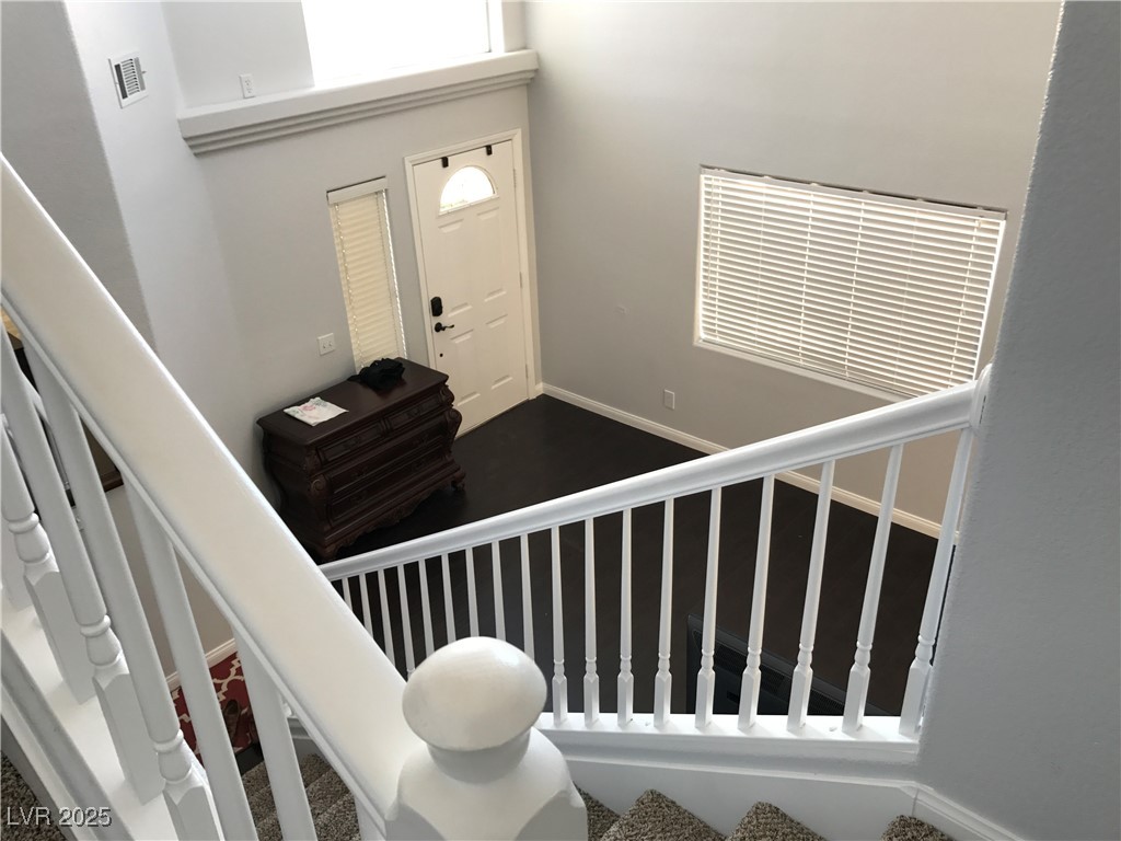 5423 Dancing Bear Drive Las Vegas, NV 89113 - Photo 4 of 18 Foyer with carpet floors and a towering ceiling