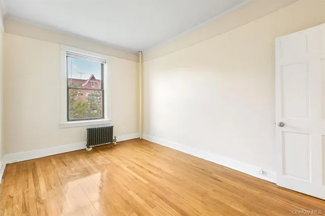 a view of an empty room and window