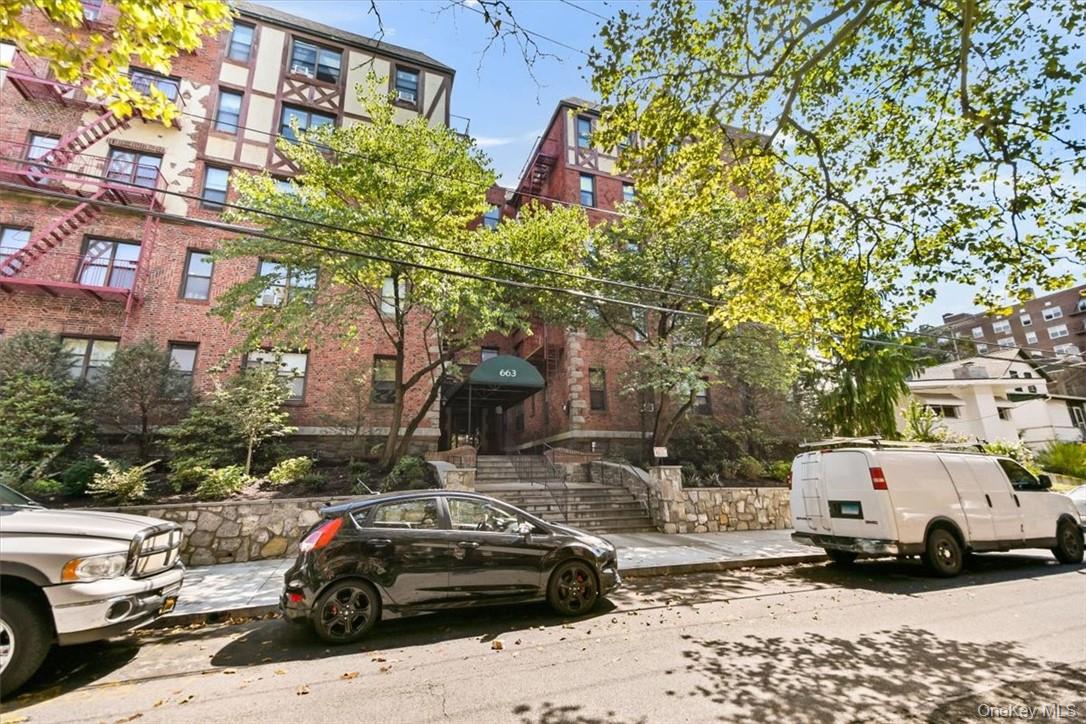663 Locust Street, Unit 4A Mount Vernon, NY 10552 - Photo 24 of 31 a view of a cars parked in front of a building