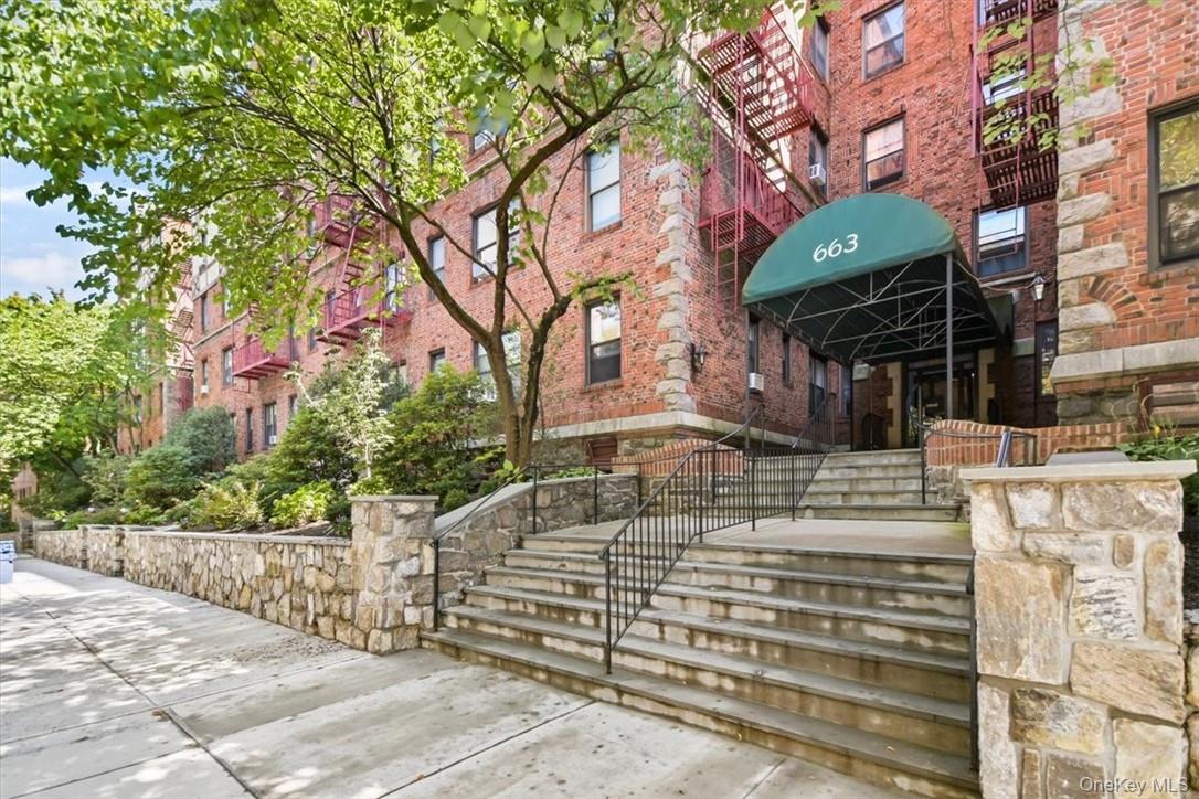 663 Locust Street, Unit 4A Mount Vernon, NY 10552 - Photo 28 of 31 a front view of a house with a tree