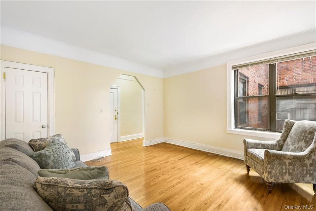 663 Locust Street, Unit 4A Mount Vernon, NY 10552 - Photo 6 of 31 a living room with furniture and a large window