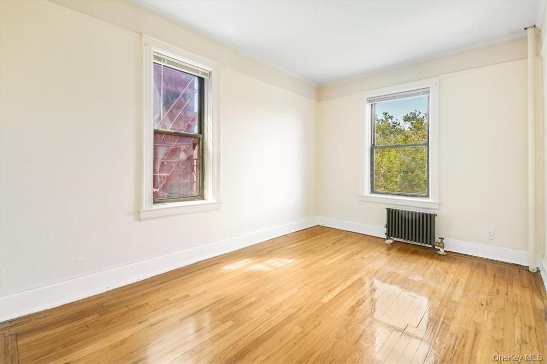 663 Locust Street, Unit 4A Mount Vernon, NY 10552 - Photo 10 of 31 an empty room with windows