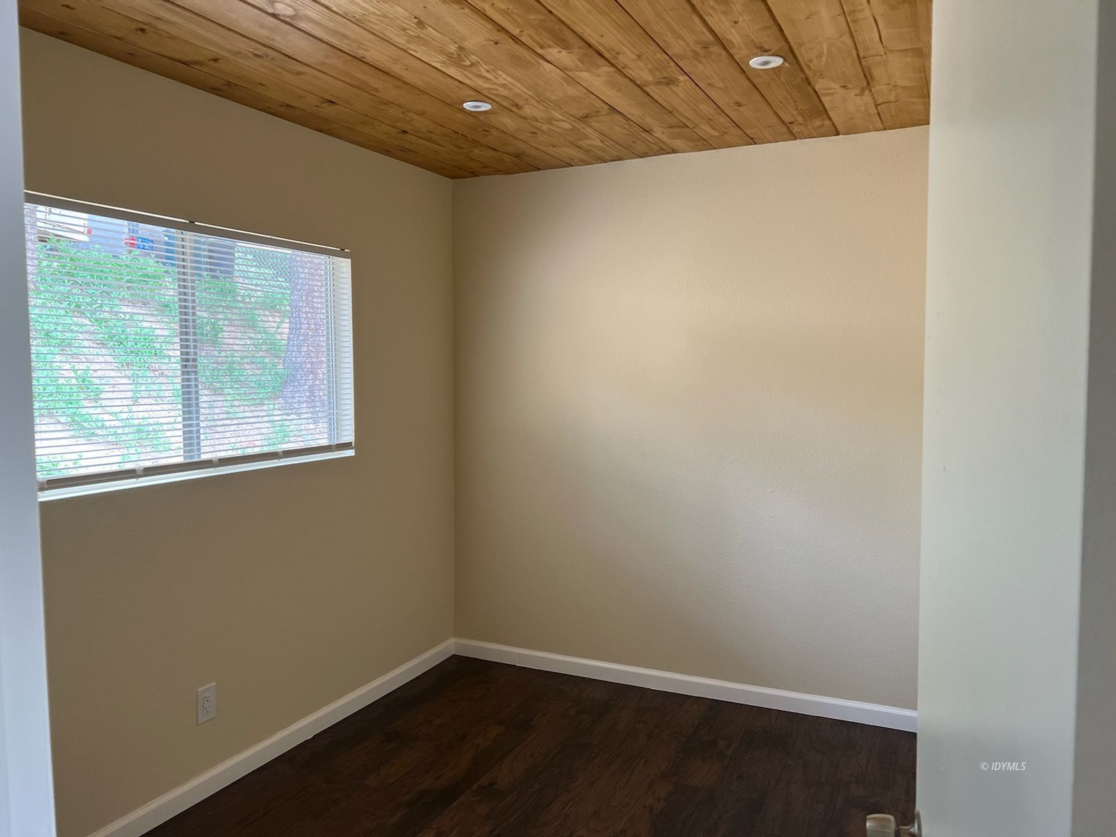 25840 Highway 243, Unit 24 Idyllwild, CA 92549 - Photo 4 of 7 a small space with wooden floor and windows