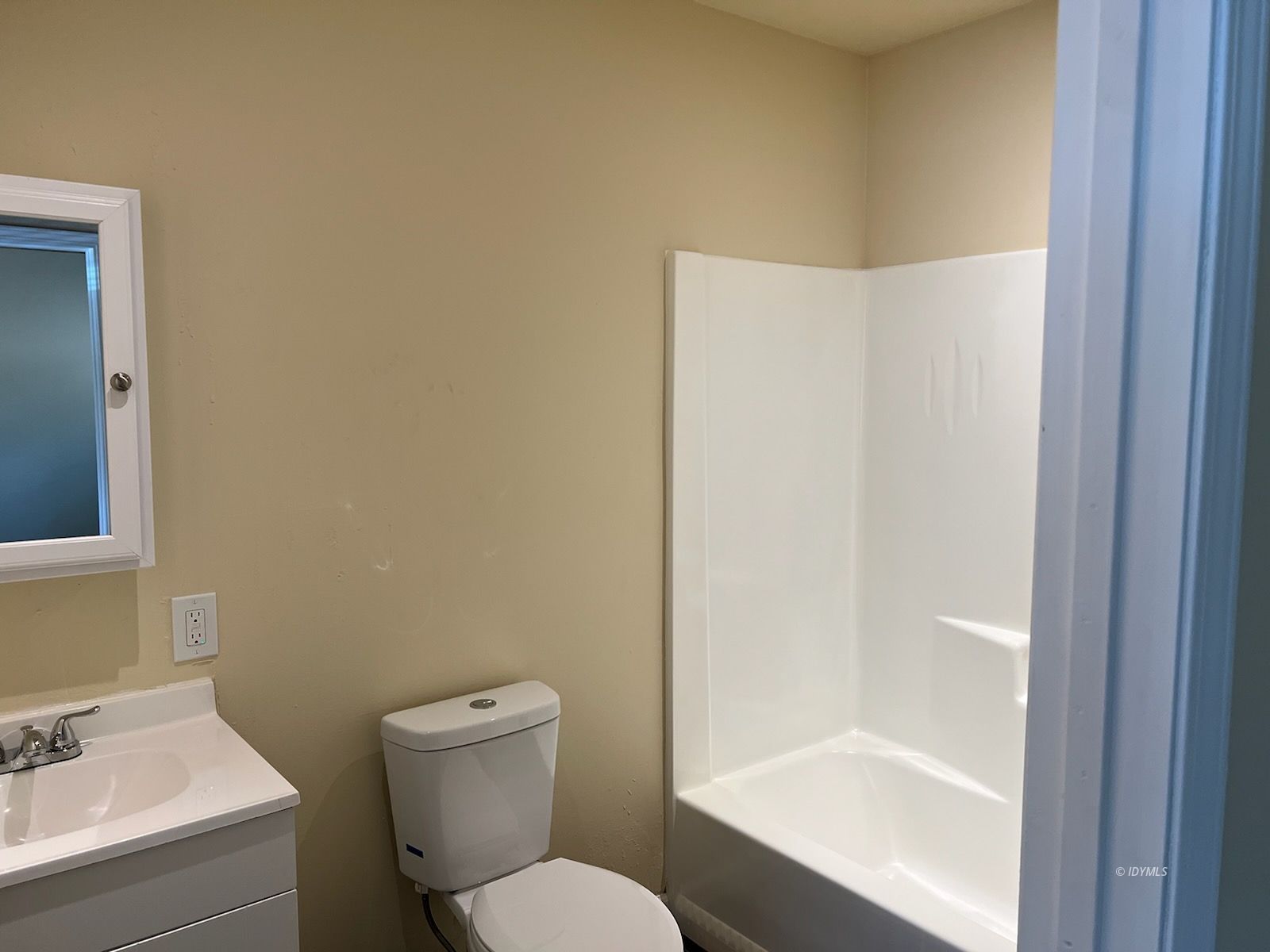 25840 Highway 243, Unit 24 Idyllwild, CA 92549 - Photo 6 of 7 a white toilet sitting next to a bathroom sink