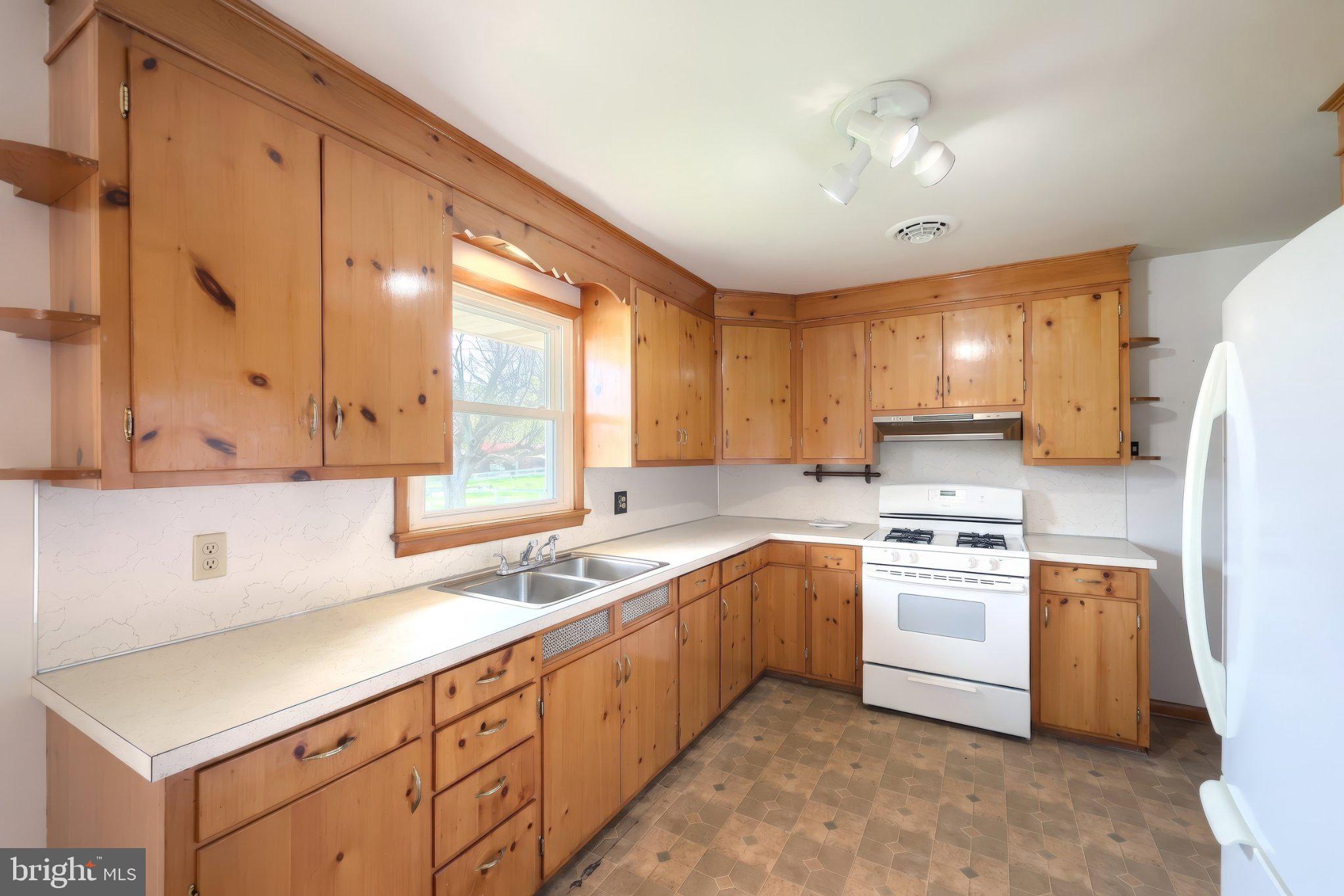 860 Witmer Road York, PA 17406 - Photo 12 of 40 Charming kitchen with natural wood accents.